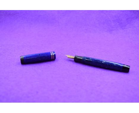 A Parker Duofold button fill fountain pen in blue marble with two narrow bands to cap and Parker Duofold B. Approx 12cm