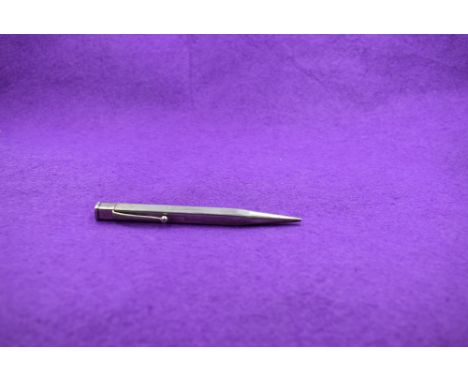 A Hallmarked Sterling Silver Yard o Led mechanical pencil. Square body with engine turned decoration. Engraved G.T.L