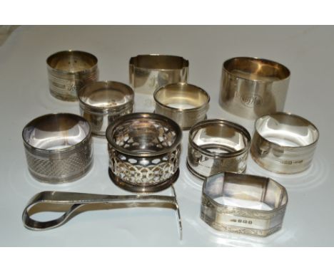 A silver napkin ring, engine turned, Birmingham 1940;  another, Birmingham 1929;  a silver pusher, Birmingham 1924; etc. (280