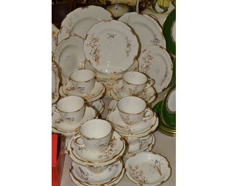 A Royal Crown Derby Devonshire tea service, comprising two dinner plates, fourteen starter plates, one soup dish, one side pl