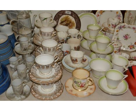 Ceramics  - an Art Deco Standard China tea service, decorated in green and silvered;  another;  a Japanese egg shell tea serv