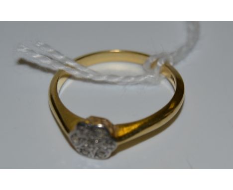 A diamond chip cluster ring, 18ct shank, 2.5g
