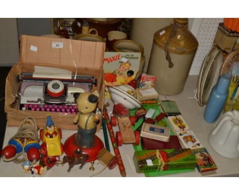 Toys - a Mettoy Elegant child's typewriter;  a Sooty night light'  playing cards;  spinning top;  etc