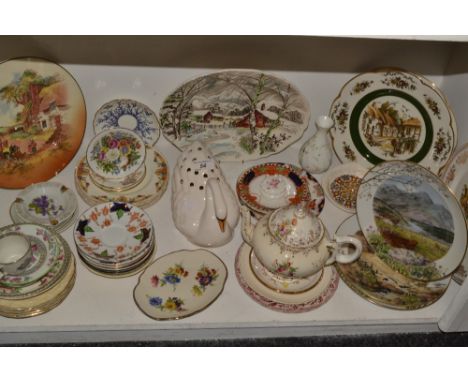 A set of three Royal Worcester plates, Beside the River, etc , by Peter Barnett; a Royal Doulton plate; teaware; etc