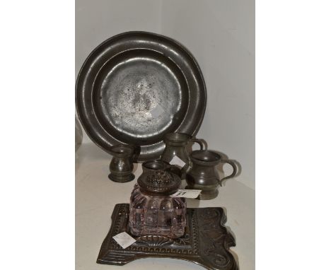 A Victorian cast iron inkwell, lobed well, the base cast with stylised foliage, c.1900;  an early 19th century pewter plate; 
