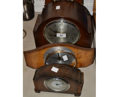 An Everite oak mantel clock, c.1930;  another, Enfield;  etc (3)