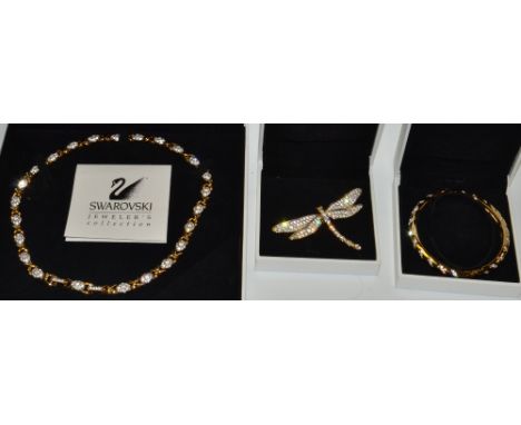 A Swarovski Jeweler's Collection necklace, boxed;  a Swarovski Jeweler's Collection brooch of a dragonfly;  a Swarovski Jewel