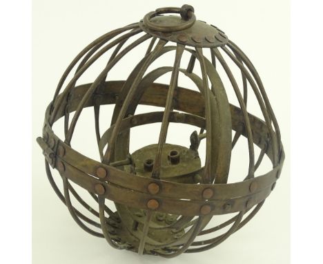 A gimballed brass globe-shaped whaling ship oil lamp, diameter 20 cm