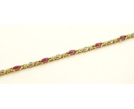 A 9 ct gold ruby & diamond set line bracelet