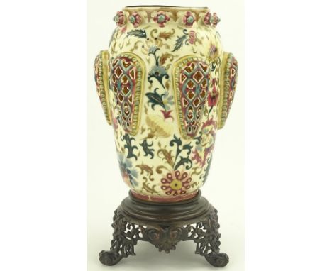 A Zsolnay Pecs oil lamp base, applied floral bosses to the rim, raised pierced side panels and painted enamel flowers, on orn
