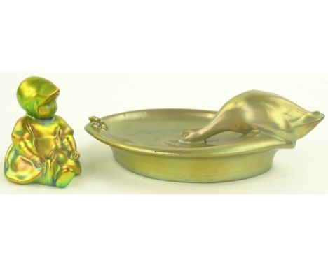 A Zsolnay silver Eosin glaze dish surmounted by a goose and frog, length 20 cm and a small green Eosin glaze Dutch child, hei