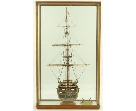 A scratch built cut away model of H M S Victory, made by P Cook in 1996, mounted in glazed display case, overall height 79 cm