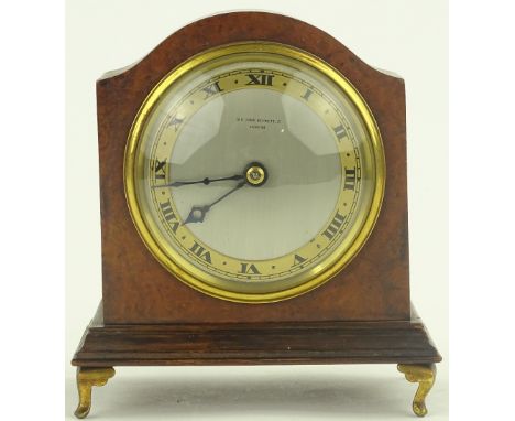 A small burr walnut cased mantel clock, by Sir John Bennett Ltd of London, brass feet, with 8 day movement, height 15 cm