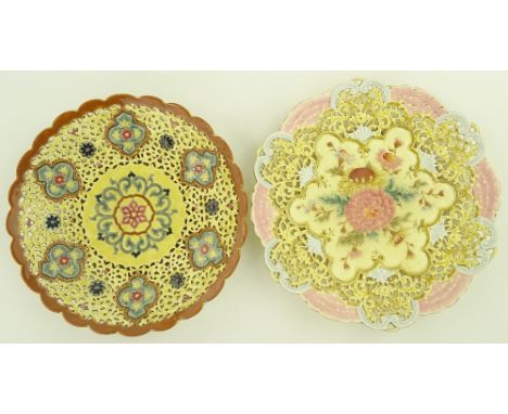 2 Zsolnay Pecs table centre dishes, pierced and embossed decoration with painted enamel designs, pattern 3775, the other unre