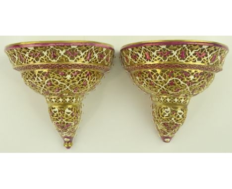 Pair of Zsolnay Pecs painted and gilded wall brackets, pierced geometric designs, pattern no. 3318 height 19.5 cm width 21 cm