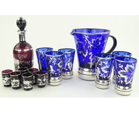 7- piece blue glass and silver overlay drinks set, jug height 20cm, and a similar purple glass overlay Venetian decanter & to