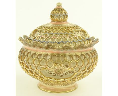 A Zsolnay Pecs reticulated bonbonniere urn and cover, c 1900, painted and gilded decoration, pattern no 2397, diameter 14 cm,