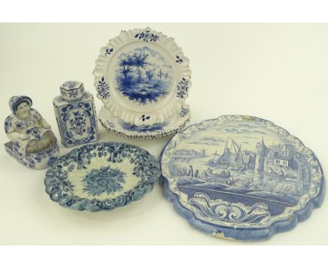 Group of Delft blue and white pottery, including a wall plaque with painted canal scene, 36 cm, tea caddy, plates etc (7)