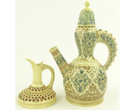 A Zsolnay Pecs relief moulded ewer and cover, pattern 3987, height 25 cm, and Zsolnay Pecs reticulated ewer, height 11 cm (2)
