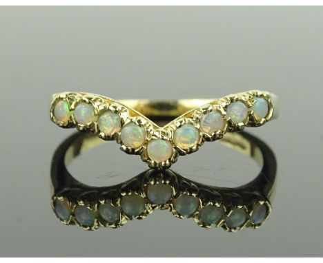 A 9 ct gold opal set wishbone ring, size Q