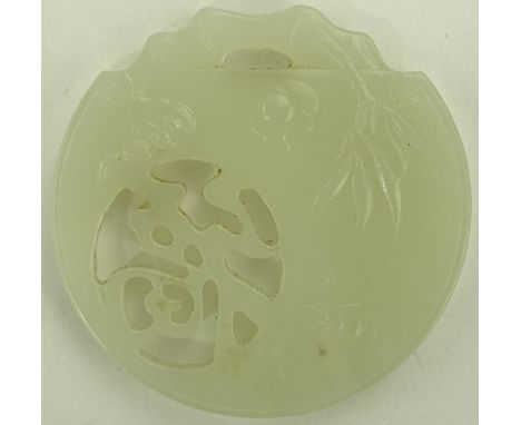 A Chinese relief carved & pierced jade pendant, width 55 mm
