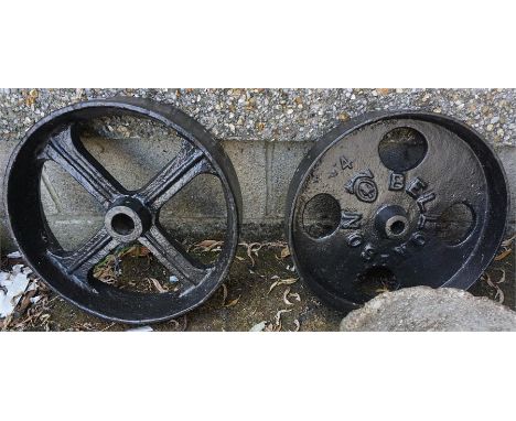 Two Black Painted Cast Iron Wheels, one named to Bellow & Son, 37cm diameter, (2)