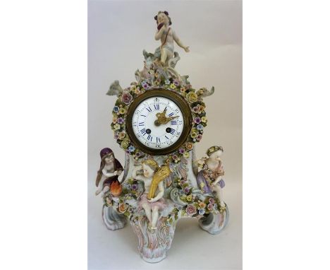 A Fine Continental Meissen Style Porcelain Mantel Clock, circa 19th century, decorated with a putti figure surmount above thr