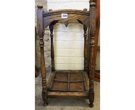 An Oak Stick Stand, 57cm high, also with an oak medicine cabinet and a table lamp, (3)