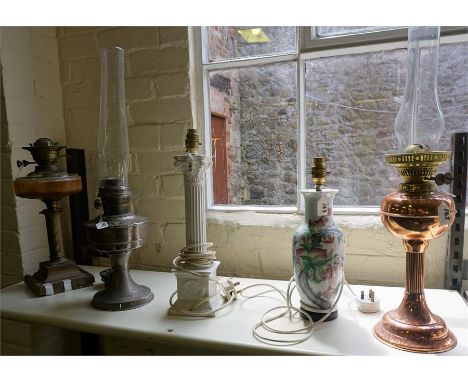 A Mixed Lot Of Oil Lamps & Table Lamps, to include a vintage oil lamp with glass reservoir, copper oil lamp, Chinese lamp bas