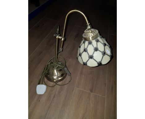 A SMALL TIFFANY STYLE LAMP