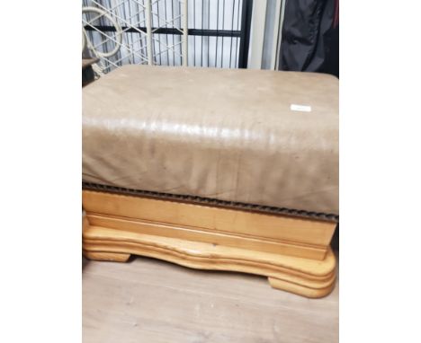 A WOOD FRAMED STORAGE POUFFE