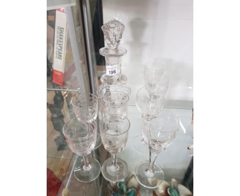 DECANTER WITH STOPPER AND 8 NICELY ETCHED DRINKING GLASSES