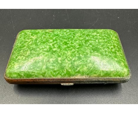 A vintage green mottled marble or shagreen effect celluloid cigarette case with brass surround 
