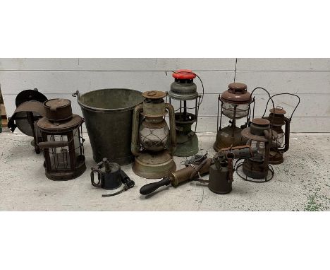 A selection of industrial metal items to include vintage lamps 