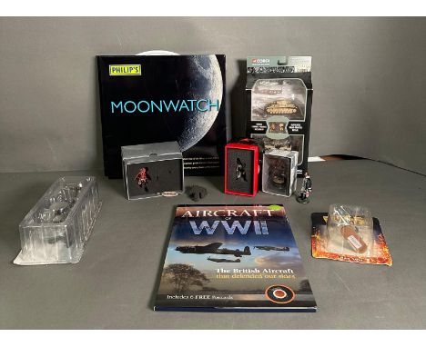 A varied selection of items to include lead figures, Corgi army vehicles etc 