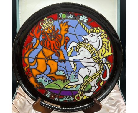 A Poole pottery silver Jubilee plate, designed by Tony Morris, box no certificate (Dia32cm)