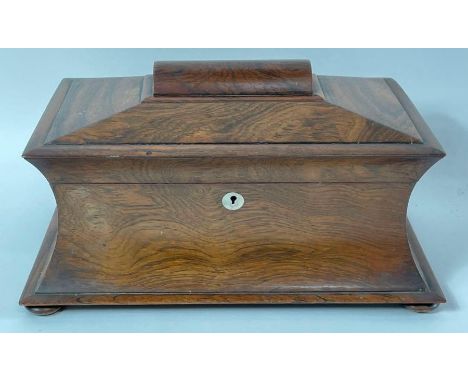 A Victorian rosewood sarcophagus shaped tea caddy 
