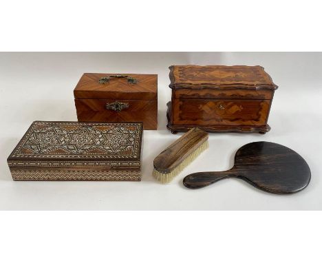A 20th century kingwood tea caddy, along with a inlaid tea caddy, another box, a hand mirror and brush 