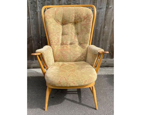 A modern beech and elm Ercol open armchair 