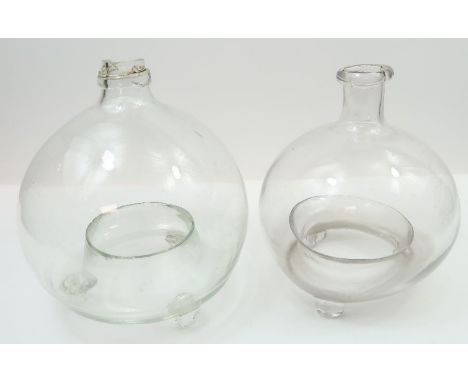 Two Victorian clear glass wasp catchers &amp; a blue glass vase, with white enamel and gilt decoration, 15cm high; along with