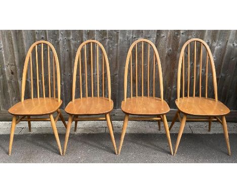 A set of four Ercol elm and beech chairs 