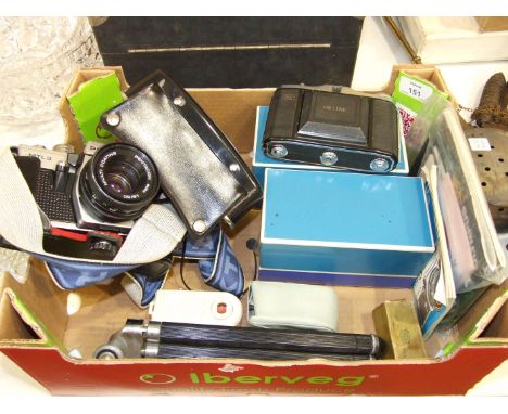 A Praktica MTL3 camera with two spare lenses, a Zeiss Nettar camera, (a/f) and other accessories.
