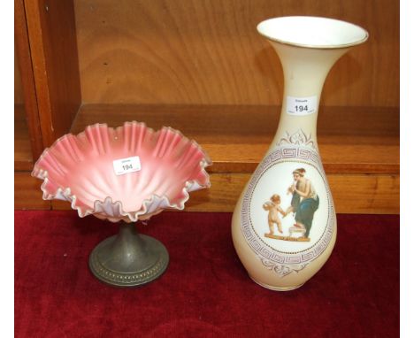 A pink satin glass tazza with wavy rim, on plated stand, 23.5cm diameter, 17cm high and a yellow satin glass vase decorated w