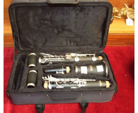 A modern Rosetti clarinet in carrying case.