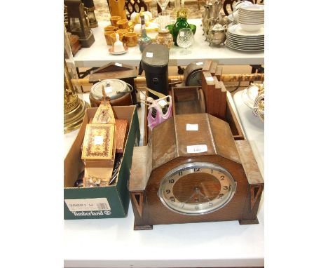 An oak-cased chiming mantel clock, 23cm high, two smaller mantel timepieces, a pair of Scheffel Zoom 10x-30x50 binoculars in 