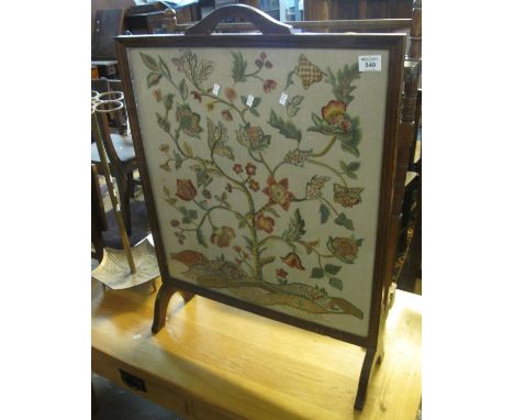 Early 20th Century oak framed firescreen with multi-coloured flowers and foliage. (B.P. 24% incl. VAT) 