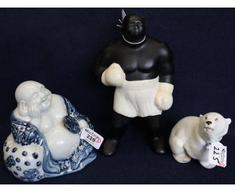 USSR seated polar bear, together with a Chinese blue and white Buddha and a ceramic boxing figurine. (3)(B.P. 24% incl. VAT) 