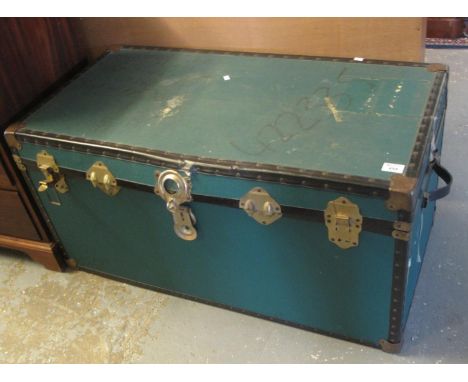 Vintage canvas and metal banded trunk with carrying handles. (B.P. 24% incl. VAT) 