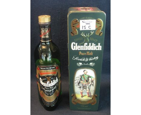 Single malt Glenfiddich pure malt Scotch whisky, 750ml, in tin box with man in kilt. (B.P. 24% incl. VAT) 