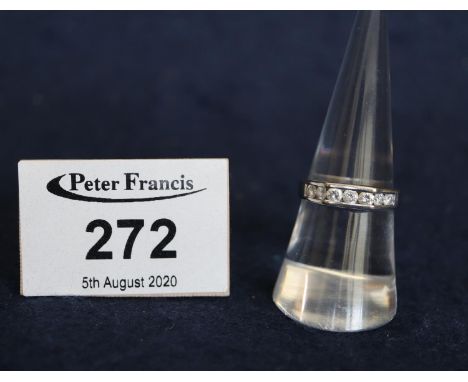 An 18ct white gold shaped half eternity style ring. Total diamond weight 0.50cts, ring size M & 1/2. Weight 3.7g approx.(B.P.